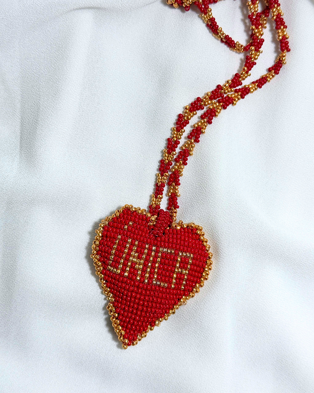 Collar chunky rojo con dorado