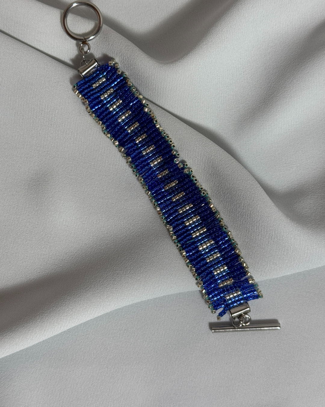 Pulsera oceánica plateada