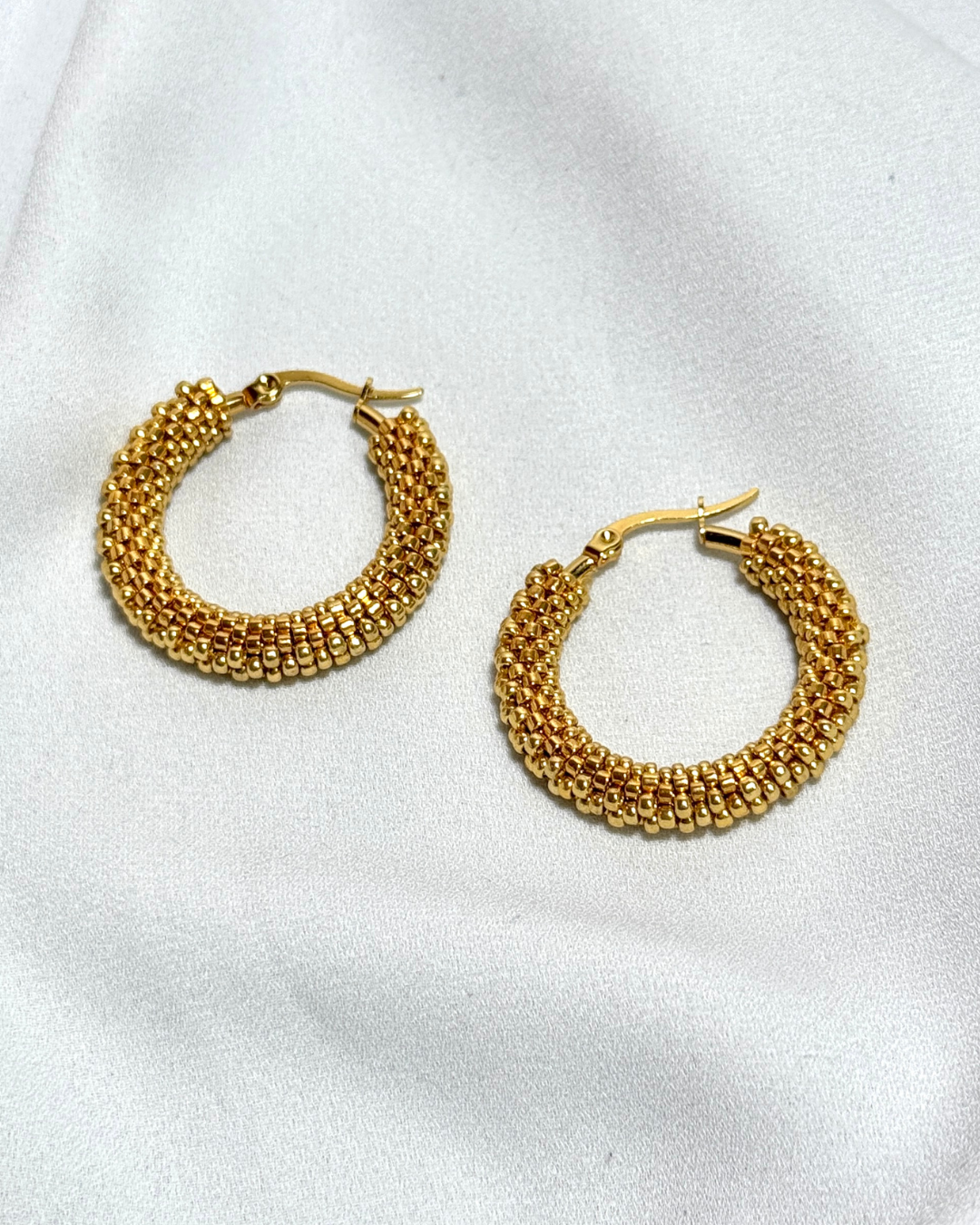 Aretes sol de oro