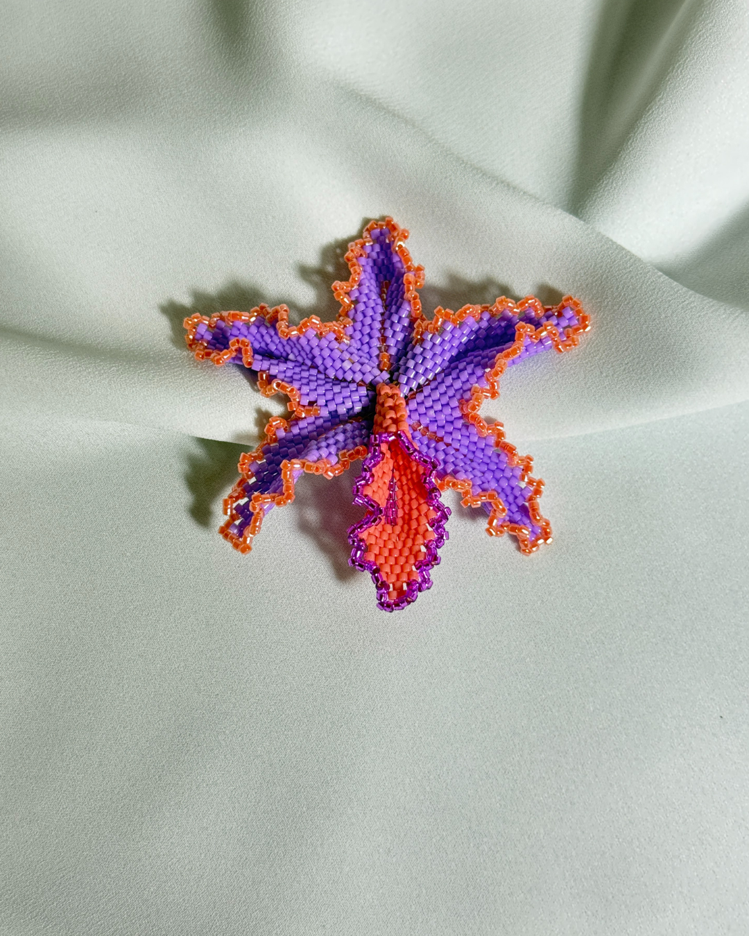 Dije orquidea morada