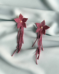 Aretas estrella floral magenta