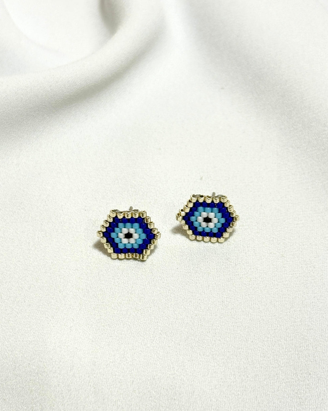 Topos ojos turcos plateados