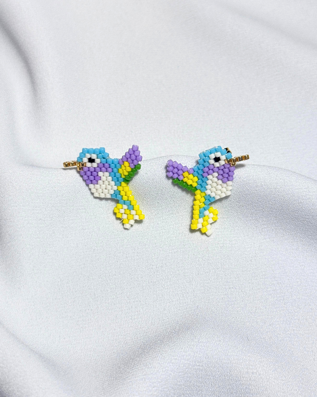 Aretas espíritu colibrí amarillo